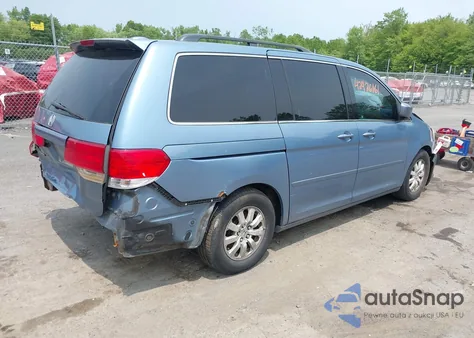 2010 Honda Odyssey Ex-L z USA, uszkodzony, nr VIN 5FNRL3H79AB084193